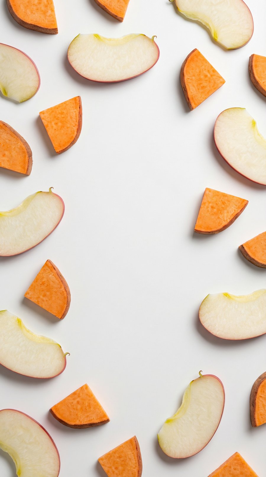 Flat lay of apple slices and sweet potato