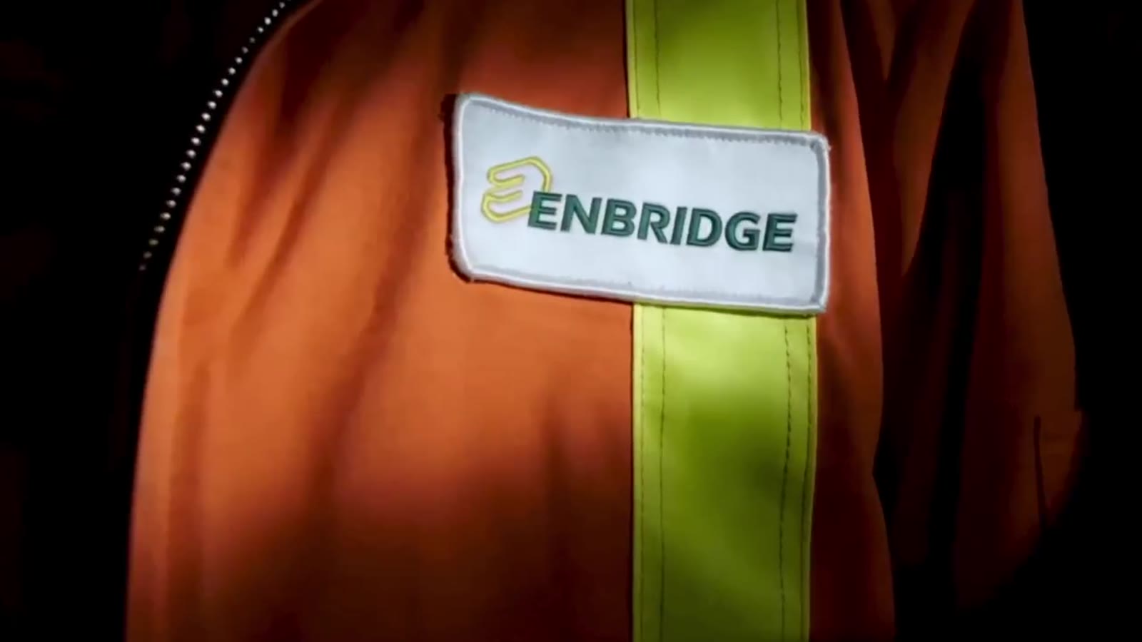 Enbridge patch on a hi-vis jacket