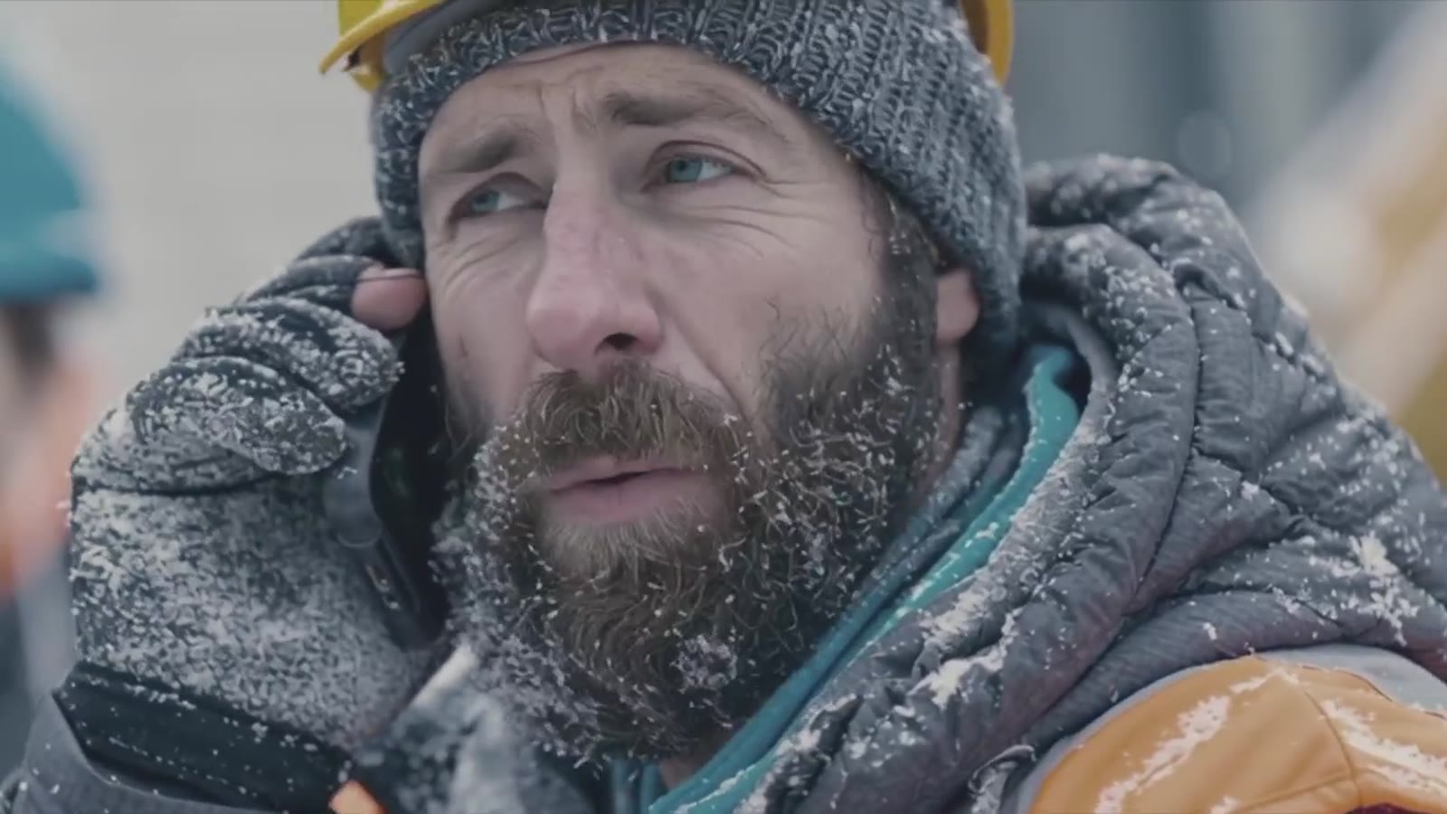Enbridge worker in frost on the phone