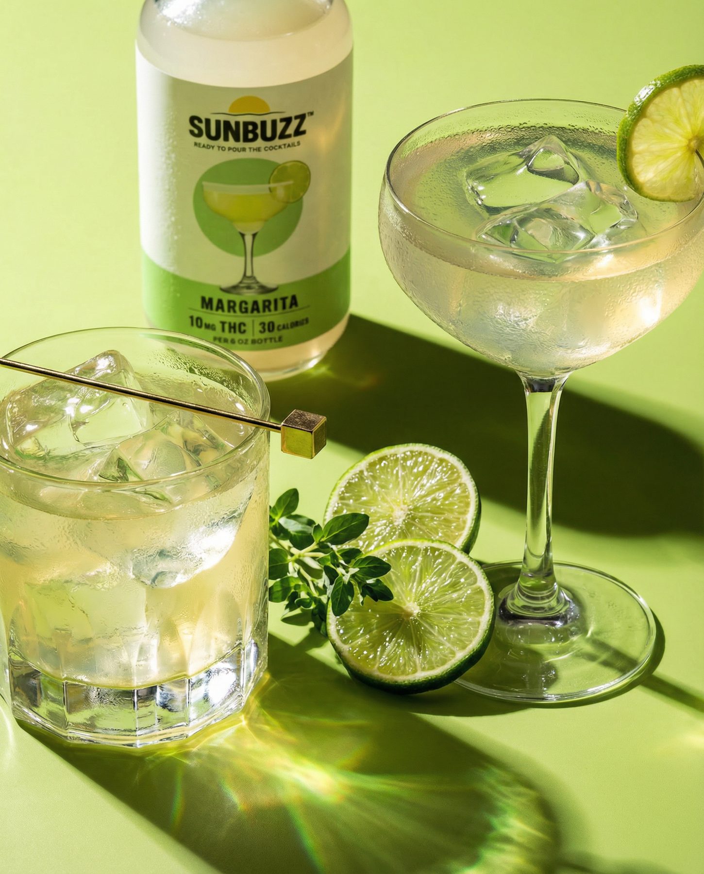 SunBuzz Margarita with a coupe and lime on green