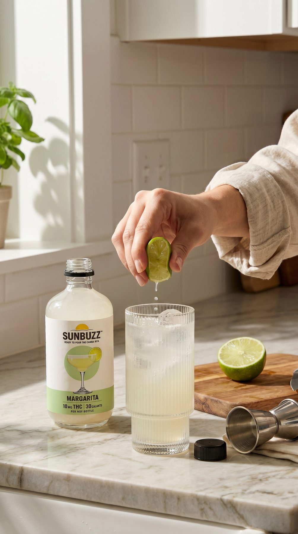 Squeezing lime into a SunBuzz Margarita